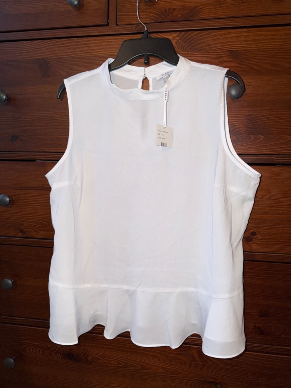 Sioni Sleeveless Ruffle Hem Top